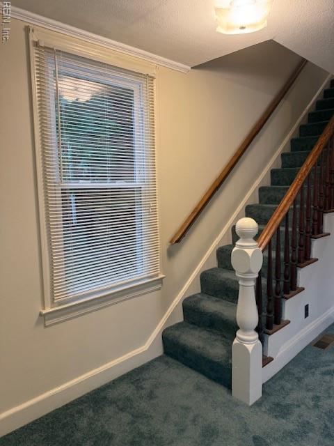 126 E Virginia Ave, Hampton, VA 23663 - staircase with carpet floors and baseboards
