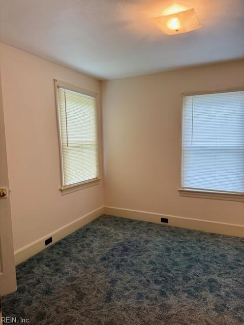 126 E Virginia Ave, Hampton, VA 23663 - carpeted empty room featuring baseboards