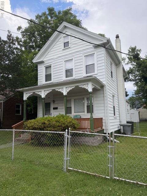 126 E Virginia Ave, Hampton, VA 23663 - view of front of property with a porch, a chimney, a fenced front yard, and a gate