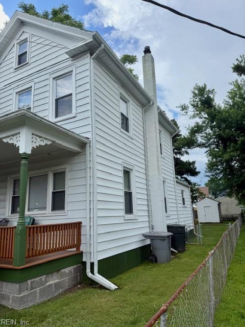 126 E Virginia Ave, Hampton, VA 23663 - view of property exterior featuring a porch and a chimney
