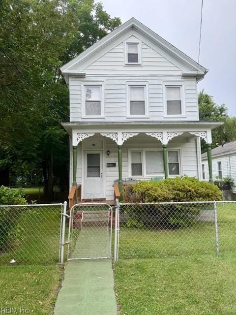 126 E Virginia Ave, Hampton, VA 23663 - view of front facade with a porch, a gate, and a fenced front yard