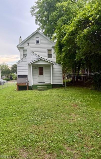 126 E Virginia Ave, Hampton, VA 23663 - back of house featuring a chimney