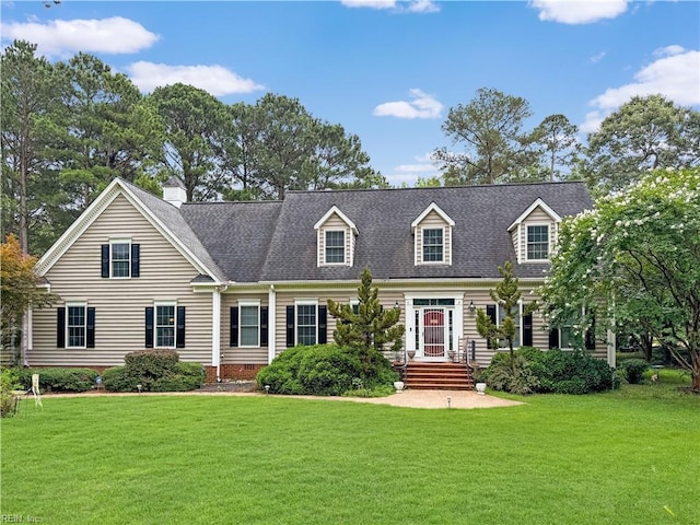 229 Skipjack Ln, Hallieford, VA 23068 - cape cod house with a front yard and roof with shingles
