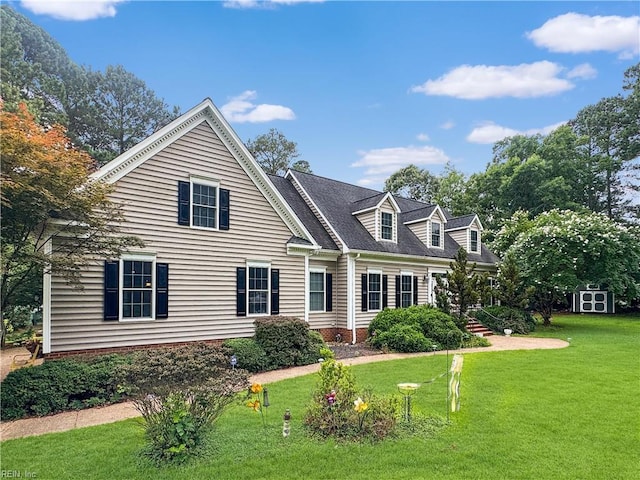 229 Skipjack Ln, Hallieford, VA 23068 - view of front facade featuring a front yard and a shed