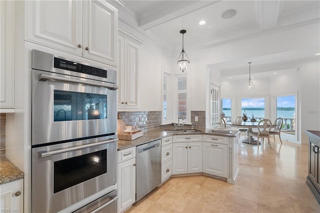 1845 N Alanton Dr, Virginia Beach, VA 23454 - kitchen with appliances with stainless steel finishes, white cabinetry, tasteful backsplash, coffered ceiling, and beamed ceiling