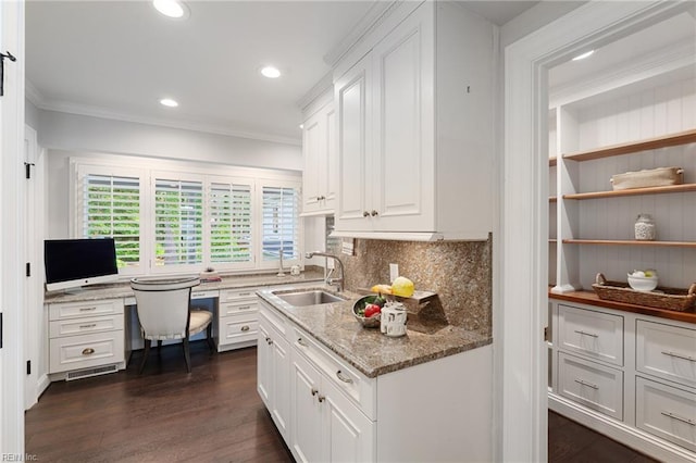 1845 N Alanton Dr, Virginia Beach, VA 23454 - kitchen featuring ornamental molding, white cabinetry, dark wood finished floors, tasteful backsplash, and light stone counters