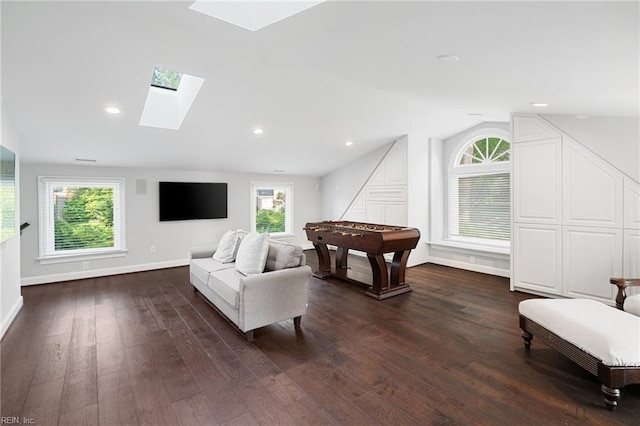 1845 N Alanton Dr, Virginia Beach, VA 23454 - living area featuring a skylight, lofted ceiling, dark wood finished floors, and plenty of natural light