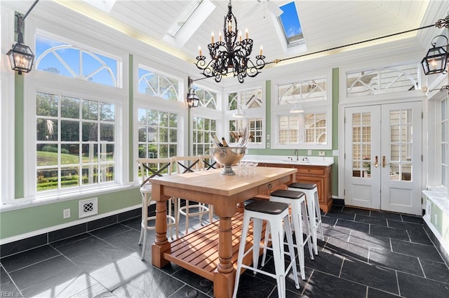 1845 N Alanton Dr, Virginia Beach, VA 23454 - sunroom / solarium featuring french doors, a chandelier, and a skylight