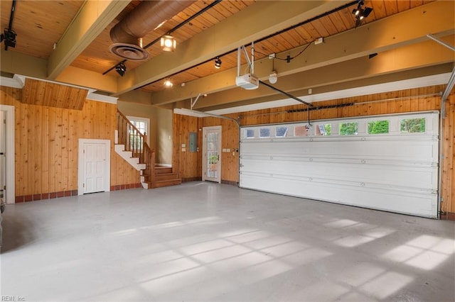 1845 N Alanton Dr, Virginia Beach, VA 23454 - garage featuring wood walls, wood ceiling, a garage door opener, and electric panel