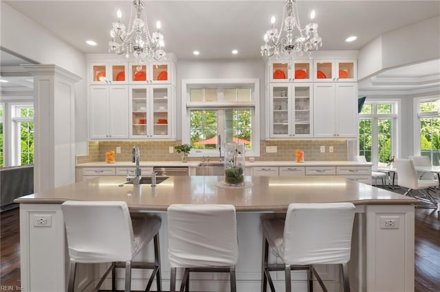 2716 Nestlebrook Trl, Virginia Beach, VA 23456 - kitchen with a chandelier, white cabinetry, a center island with sink, light countertops, and recessed lighting