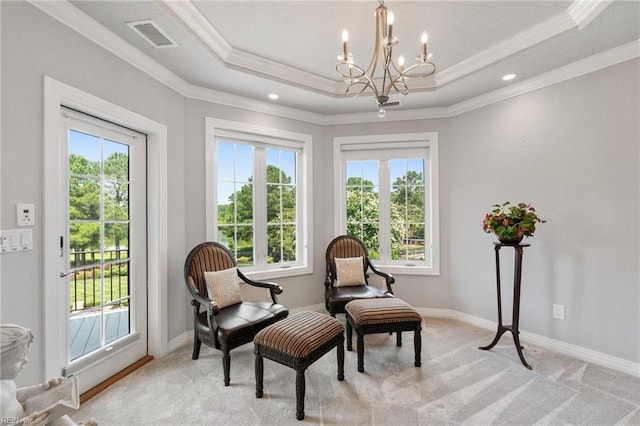 2716 Nestlebrook Trl, Virginia Beach, VA 23456 - living area with healthy amount of natural light, a chandelier, crown molding, light colored carpet, and a tray ceiling