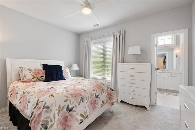 2716 Nestlebrook Trl, Virginia Beach, VA 23456 - bedroom featuring multiple windows, light carpet, connected bathroom, and ceiling fan