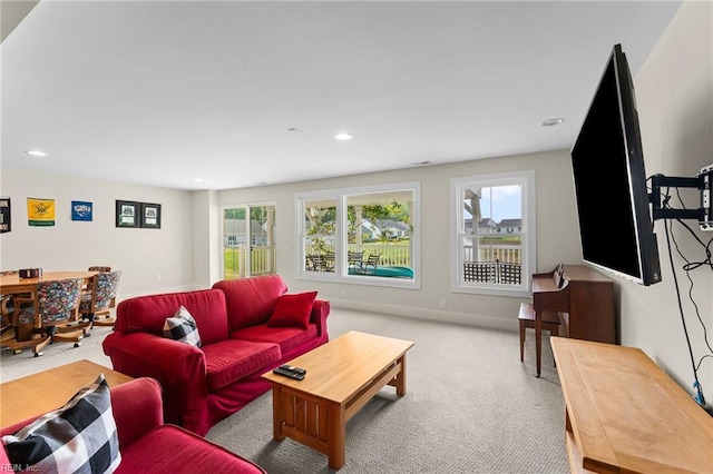 6957 Healy Ave, Gloucester, VA 23061 - living area featuring healthy amount of natural light, carpet floors, and recessed lighting