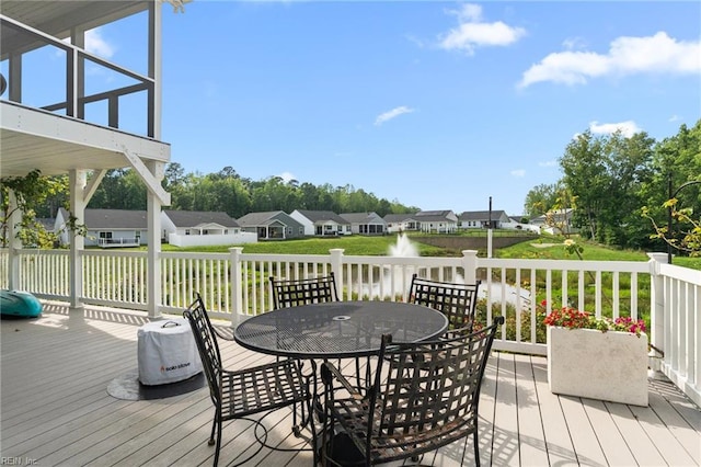 6957 Healy Ave, Gloucester, VA 23061 - wooden deck featuring a residential view and outdoor dining space