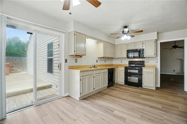 2116 Bloomsbury Ln, Virginia Beach, VA 23454 - kitchen featuring black appliances, a ceiling fan, light countertops, light wood finished floors, and a textured ceiling