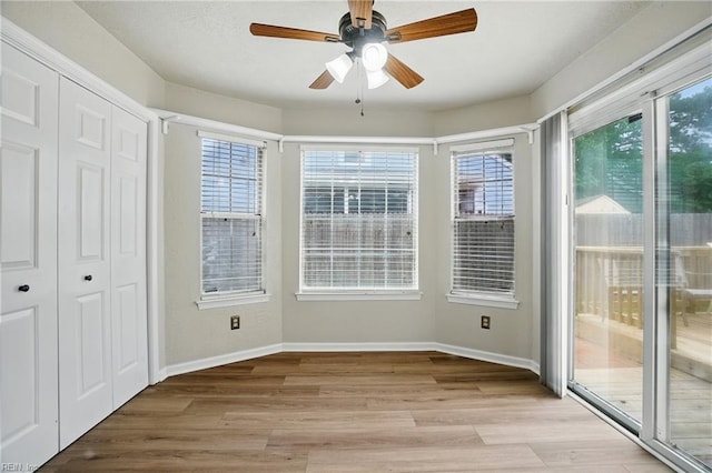 2116 Bloomsbury Ln, Virginia Beach, VA 23454 - unfurnished dining area with ceiling fan, plenty of natural light, and light wood-style floors