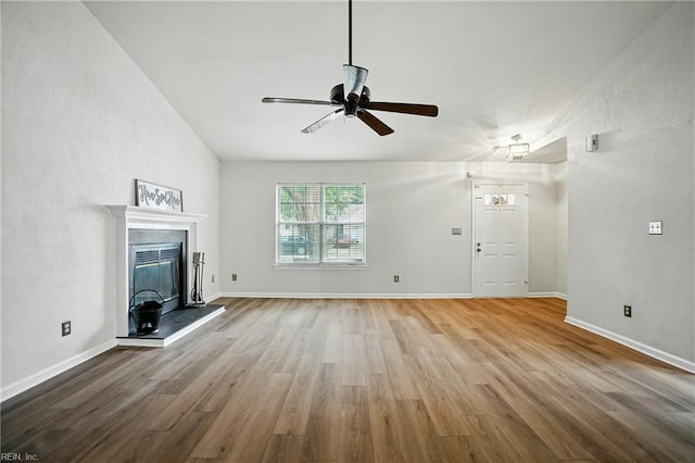 2116 Bloomsbury Ln, Virginia Beach, VA 23454 - unfurnished living room with a ceiling fan, wood finished floors, and a glass covered fireplace