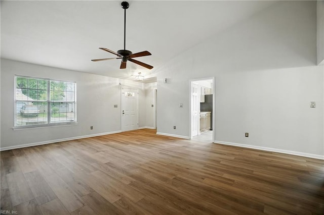 2116 Bloomsbury Ln, Virginia Beach, VA 23454 - unfurnished living room with a ceiling fan, wood finished floors, and high vaulted ceiling