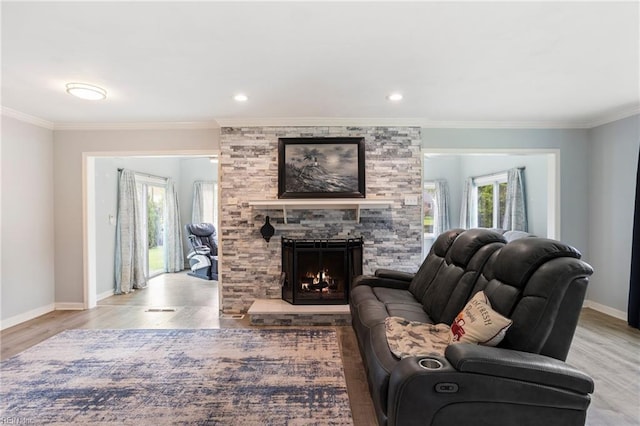 7600 Bridgette Ln, Norfolk, VA 23518 - living room with wood finished floors, ornamental molding, and a stone fireplace
