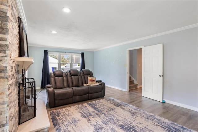 7600 Bridgette Ln, Norfolk, VA 23518 - living room with wood finished floors, stairway, crown molding, recessed lighting, and a fireplace