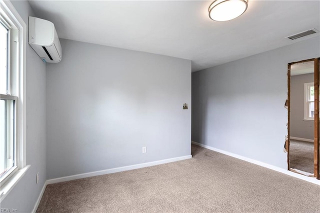 7600 Bridgette Ln, Norfolk, VA 23518 - unfurnished room with a wall unit AC and carpet