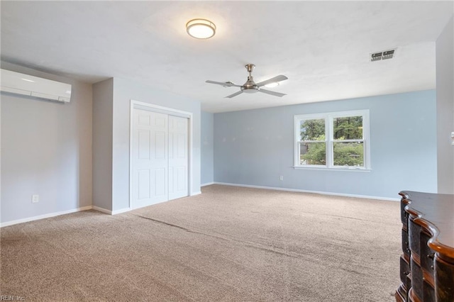 7600 Bridgette Ln, Norfolk, VA 23518 - bedroom with a wall mounted AC, carpet flooring, a closet, and a ceiling fan