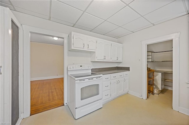 5004 Powhatan Ave, Norfolk, VA 23508 - kitchen featuring white electric stove, white cabinets, a drop ceiling, and dark countertops