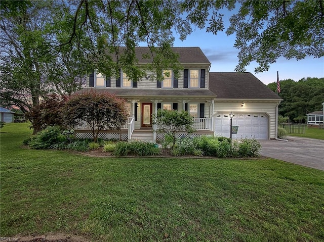 1757 Mill Landing Rd, Virginia Beach, VA 23457 - colonial inspired home with driveway, a porch, an attached garage, and a front yard