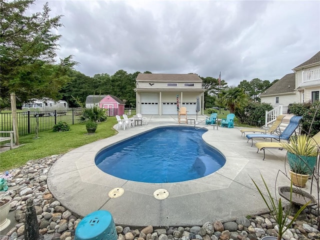 1757 Mill Landing Rd, Virginia Beach, VA 23457 - view of swimming pool featuring a patio area and an outbuilding