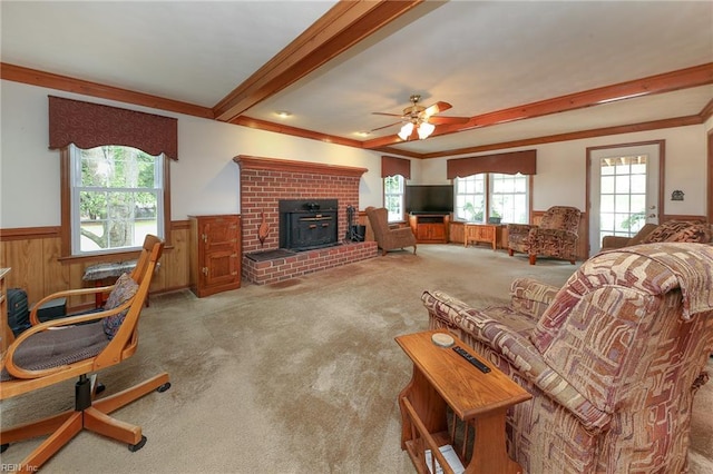 1757 Mill Landing Rd, Virginia Beach, VA 23457 - living area with a wainscoted wall, carpet, beam ceiling, wood walls, and a ceiling fan