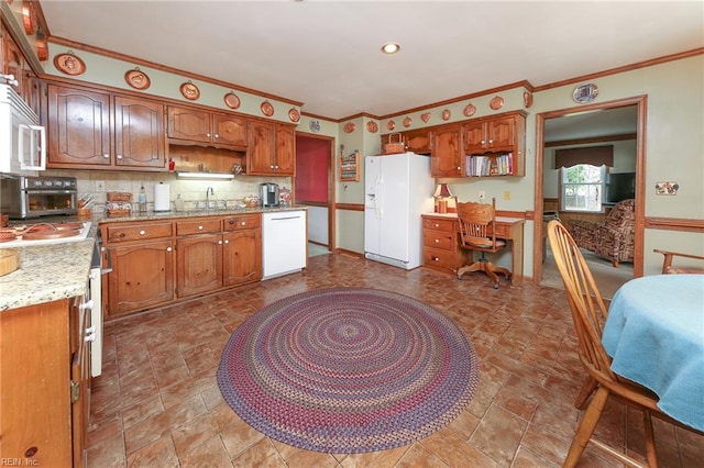 1757 Mill Landing Rd, Virginia Beach, VA 23457 - kitchen with white appliances, ornamental molding, backsplash, brown cabinetry, and light stone counters