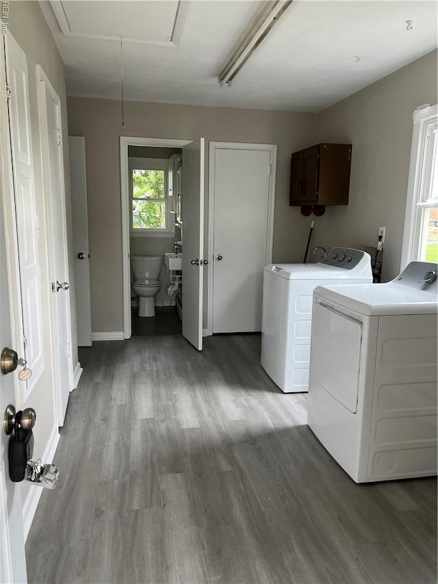 2453 Malden Ave, Norfolk, VA 23518 - laundry area with washing machine and clothes dryer, light wood-style flooring, and attic access