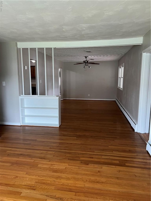 2453 Malden Ave, Norfolk, VA 23518 - spare room featuring a baseboard radiator, wood finished floors, and a ceiling fan