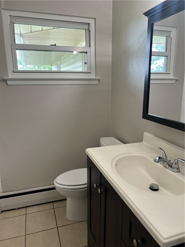 2453 Malden Ave, Norfolk, VA 23518 - bathroom featuring a baseboard heating unit, vanity, and tile patterned flooring