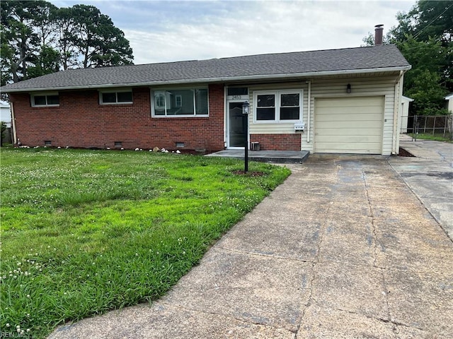 2453 Malden Ave, Norfolk, VA 23518 - single story home with crawl space, an attached garage, driveway, brick siding, and a front yard