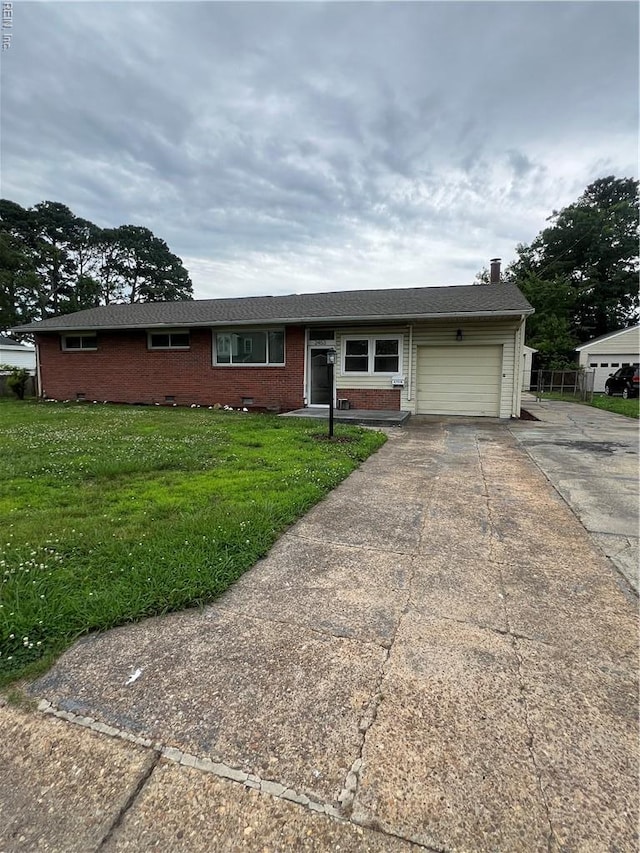 2453 Malden Ave, Norfolk, VA 23518 - ranch-style home featuring an attached garage, driveway, a front yard, and brick siding