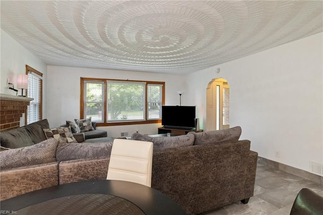 2220 Rodgers St, Chesapeake, VA 23324 - living room featuring arched walkways and baseboards