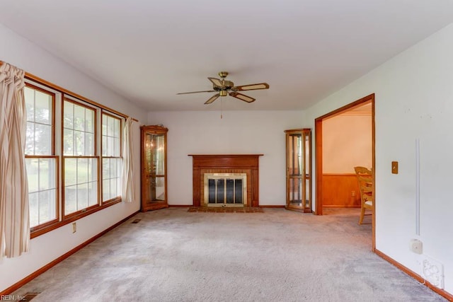 205 Haradd Ln, Williamsburg, VA 23188 - unfurnished living room featuring a ceiling fan, carpet, and a brick fireplace