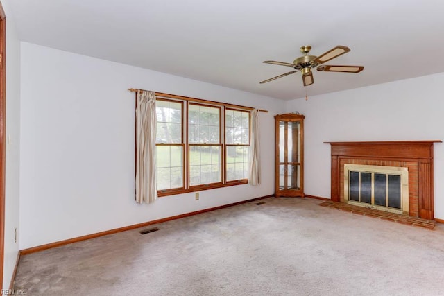 205 Haradd Ln, Williamsburg, VA 23188 - unfurnished living room with carpet flooring, ceiling fan, and a fireplace