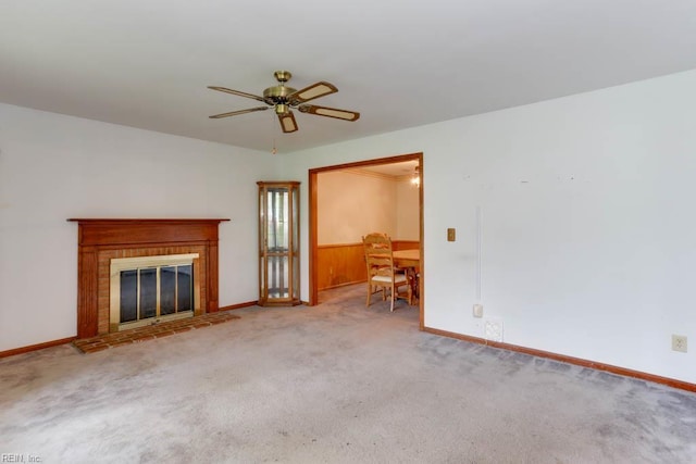 205 Haradd Ln, Williamsburg, VA 23188 - unfurnished living room with a ceiling fan, carpet, and a brick fireplace