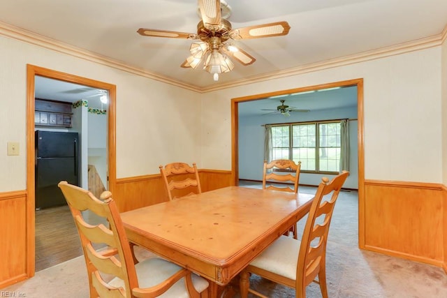 205 Haradd Ln, Williamsburg, VA 23188 - dining area with a wainscoted wall, crown molding, ceiling fan, and wood walls