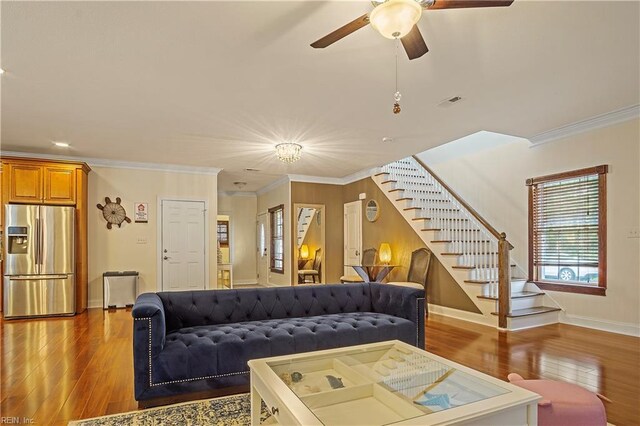 3109 Pleasant Ave, Norfolk, VA 23518 - living area featuring stairs, wood finished floors, a ceiling fan, and crown molding