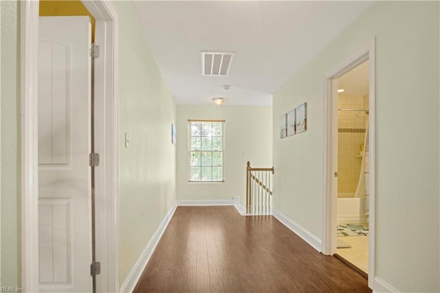 3109 Pleasant Ave, Norfolk, VA 23518 - hallway featuring dark wood-style floors, lofted ceiling, and an upstairs landing