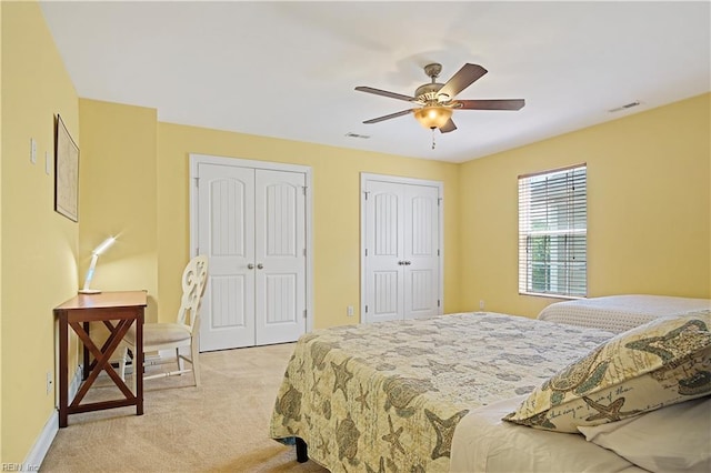 3109 Pleasant Ave, Norfolk, VA 23518 - bedroom featuring two closets, light colored carpet, and ceiling fan