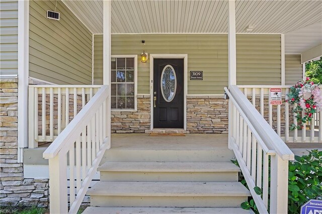 3109 Pleasant Ave, Norfolk, VA 23518 - property entrance featuring a porch and stone siding