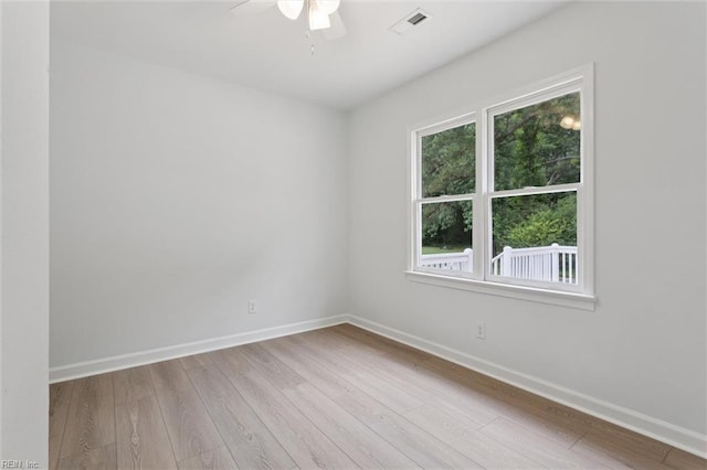 13067 Poor House Rd, Windsor, VA 23487 - empty room with wood finished floors and ceiling fan