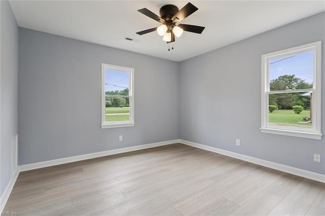 13067 Poor House Rd, Windsor, VA 23487 - spare room with light wood-style floors and ceiling fan