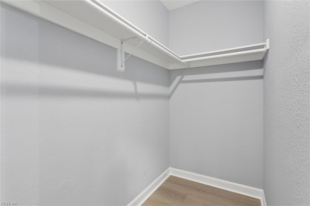 13067 Poor House Rd, Windsor, VA 23487 - spacious closet featuring wood finished floors