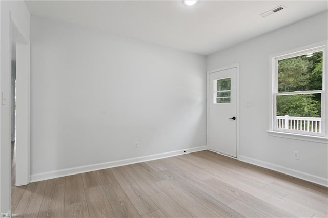 13067 Poor House Rd, Windsor, VA 23487 - spare room with light wood-type flooring and baseboards