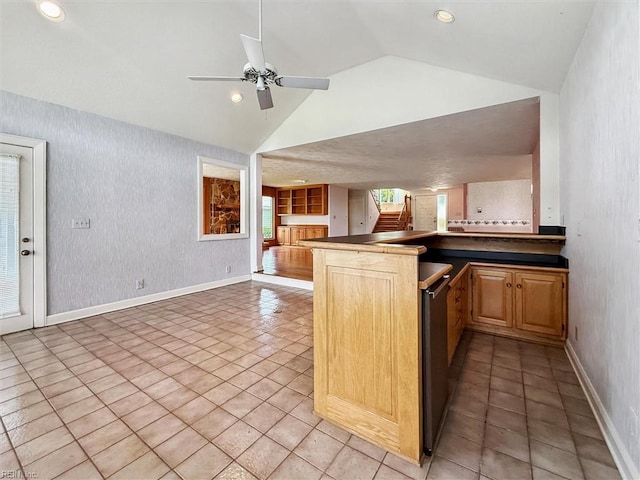 133 Randolphs Grn, Williamsburg, VA 23185 - kitchen with vaulted ceiling, dark countertops, open floor plan, ceiling fan, and a peninsula